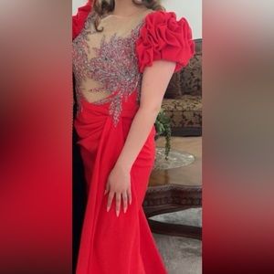 Beautiful evening gowns teal is size 8 red is size 10. Great condition.